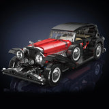 Maquette de voiture vintage noire et rouge en briques de construction pour adultes, vue latérale – BriquesDeConstruction.com
